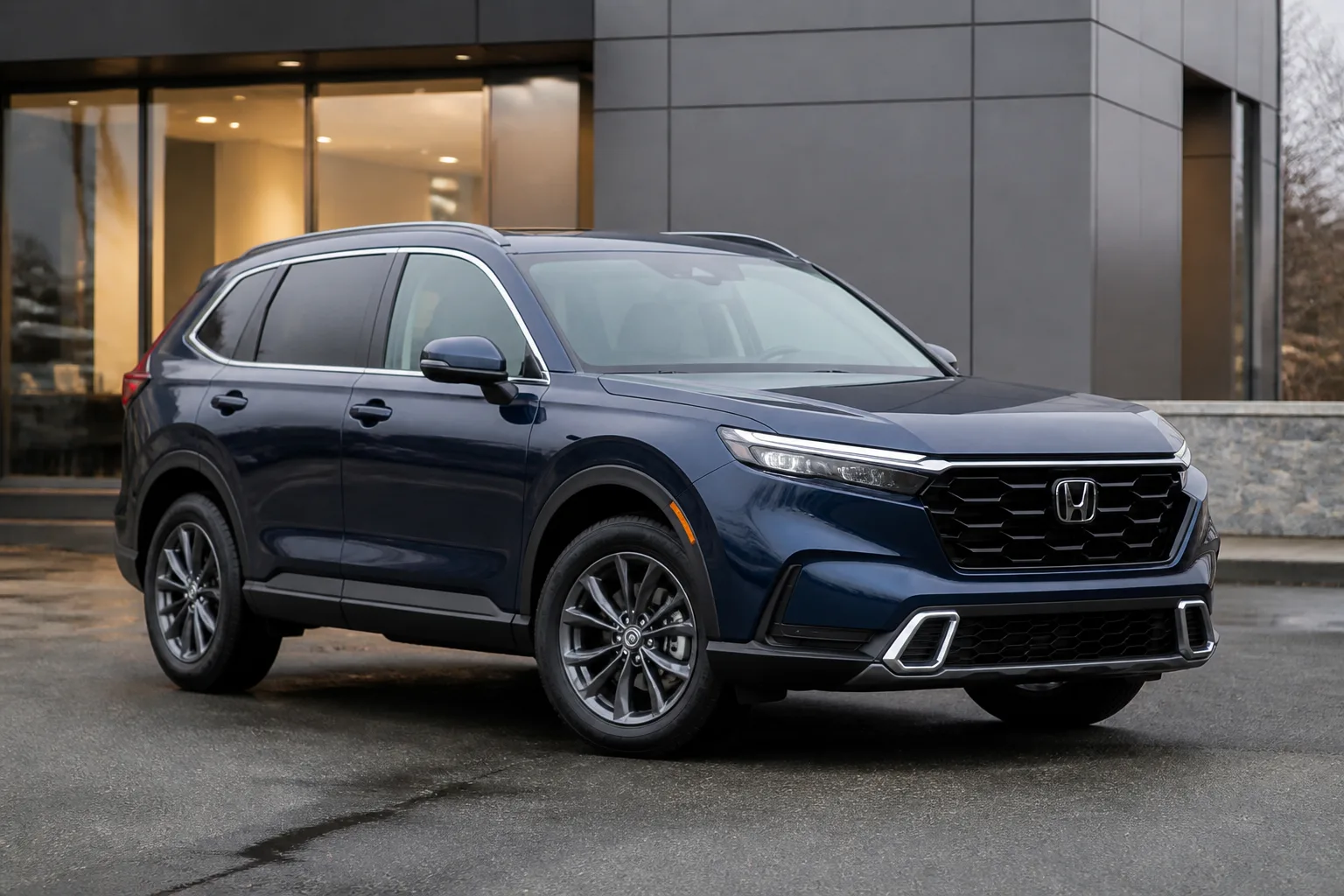 Illustrative deep blue compact family SUV outside a contemporary dealership