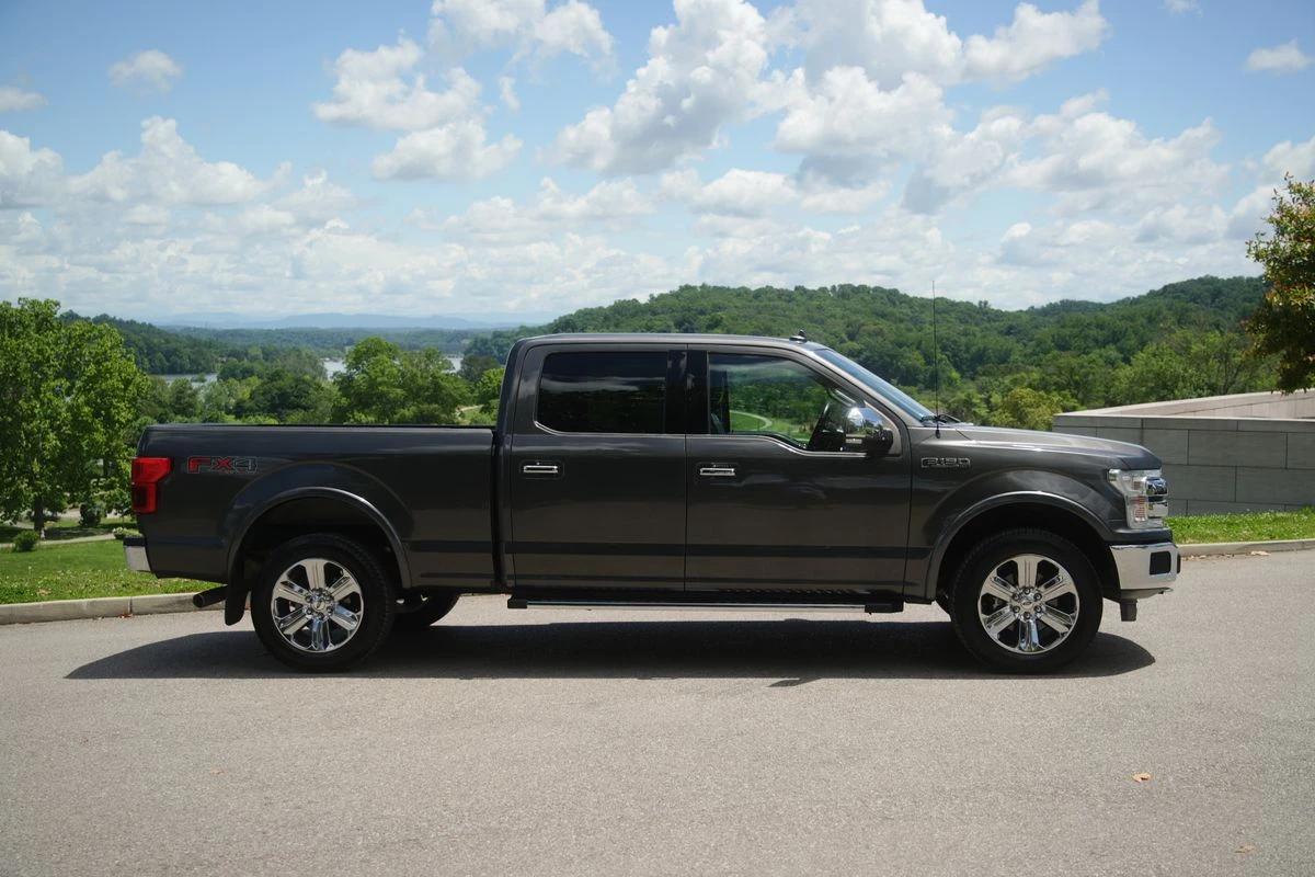 Illustrative black full-size pickup parked outdoors