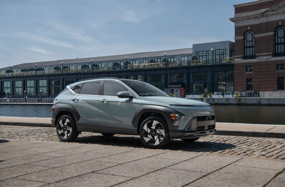 Illustrative compact SUV near an urban waterfront