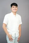 Marcus T., a young man in a white linen shirt